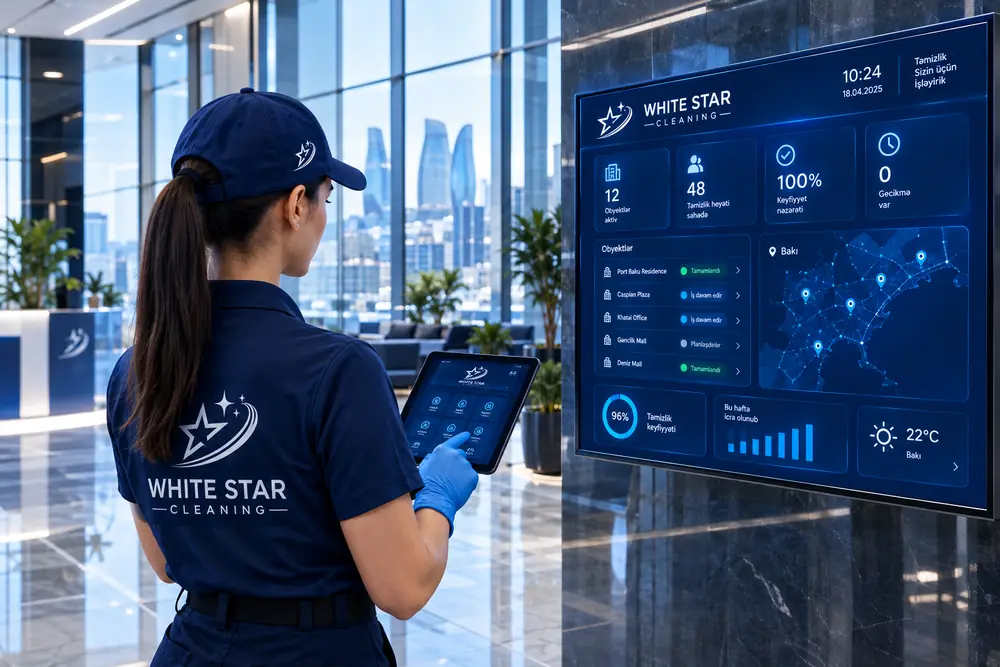 Сотрудник White Star Cleaning в современном офисе с панелью онлайн-контроля